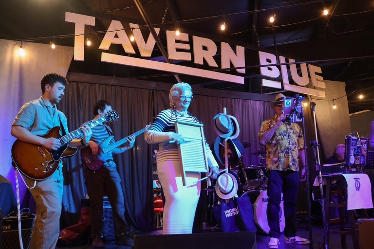 Guest musician playing washboard with Homebrewed at Taven Blue